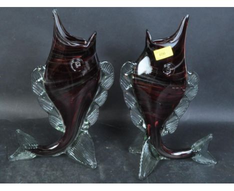 Two retro vintage 20th century Murano glass fish shaped vases having stripes effect in clear &amp; burgundy coloured glass. E