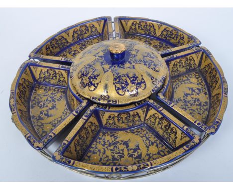 A vintage retro mid 20th century Chinese style ceramic lazy Susan. The serving tray comprising of central lidded pot with fiv