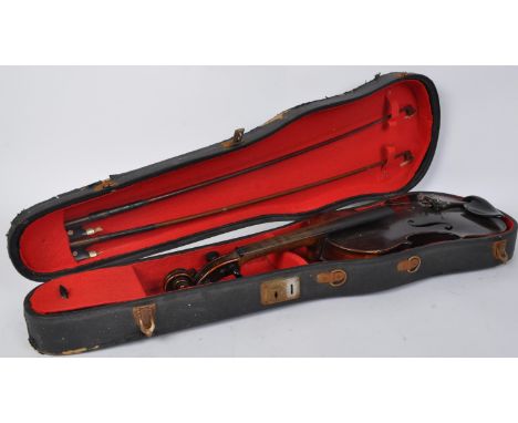 A 19th century late Victorian era violin having split back and inlaid purfling edge. Measures 58cm length. Accompanied by two