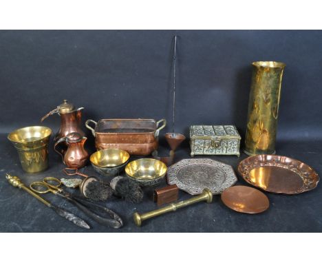 A collection of 19th century and later brass and copper items to include a copper and brass planter, a Victorian brass pestle