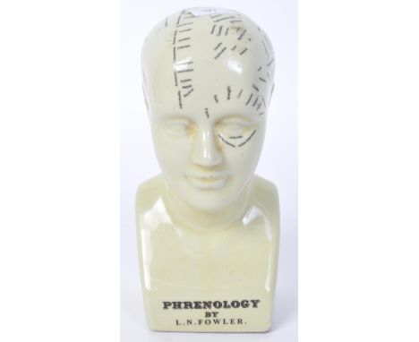 A vintage 20th century L. N. Fowler ceramic phrenology head bust having a beige ground with black lettering to surface. Measu