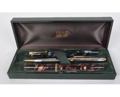 A pair of vintage circa. 1950s fountain pens to include a Mentmore and a Swan, each having 14ct gold nibs and Lucite casing. 