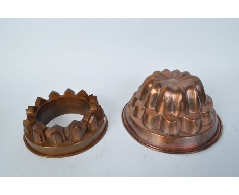 Two 19th century Victorian copper jelly moulds. To include a ring example with stamped marks 148 to surface. Measures 23cm di