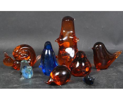 An assortment of vintage 20th century Wedgwood glass paperweights in the shape of various animals, to include an otter, a wha