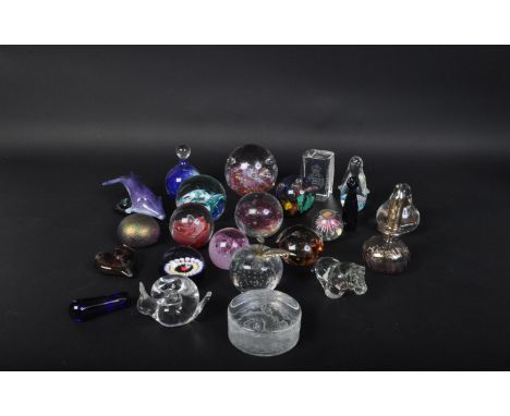 A collection of vintage 20th century glass paperweights to include a Royal Brierly style paperweight, cane-work examples, bub