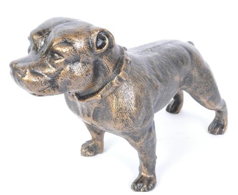 A vintage 20th Century moulded brass Pitbull Terrier dog. Of typical form, dog standing with tail and collar. Measures approx