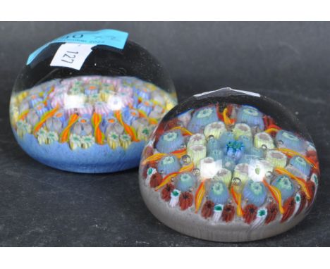 Two vintage 20th century glass Italian Murano style millefiori paperweights. Overall good condition. Measures 65mm diameter.&