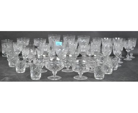 A collection of vintage 20th century English lead cut glass drinking glasses to include Tudor cut glass. The lot comprising o