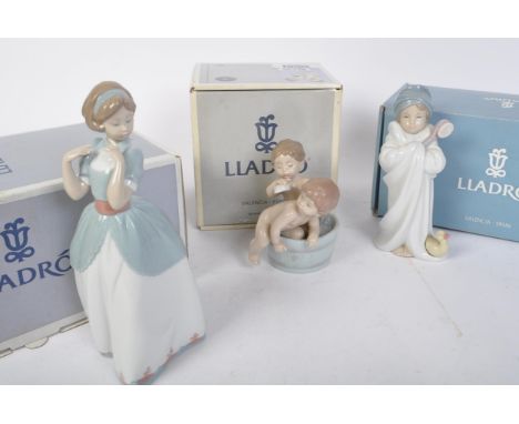Lladro&nbsp; - A collection of three boxed vintage 20th century Lladro Spanish porcelain figurines to include Bath Time 06411