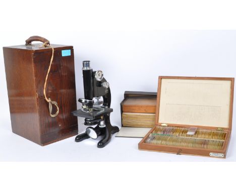 A vintage 20th Century London model 29 R &amp; J Beck Ltd microscope house in a wooden box with specimen samples in two boxes