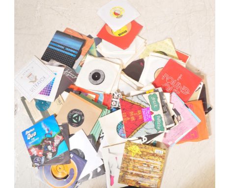 A collection of vintage 20th Century 7" 45 rpm vinyl&nbsp; single records comprising of Status Quo, Liza Minelli, Billy Joel,