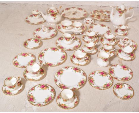 A collection of vintage 20th century Royal Albert Old Country Roses china dinnerware. The service having polychrome gilt deco