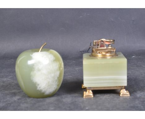 A vintage 20th century circa. 1970's onyx and brass table lighter. The table lighter being of cube form with beaded brass bea