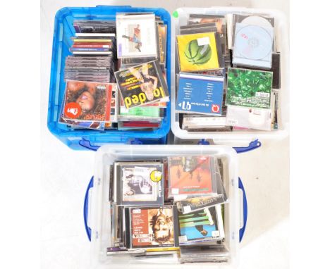 A collection of vintage 20th century CDs / compact discs comprising of Mozart, Kelis, Black Eyed Peas, Blue, Marylin Manson, 