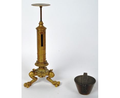 A Victorian mid 19th century circa 1850s brass&nbsp;postage scale by Joseph Edmond Ratcliffe Bro's. The scale having pad feet