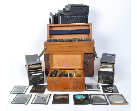 An Ensign Optiscope No 6 / 9 Lantern Slide Projector within the suitcase-type complete with cased  slides to include continen
