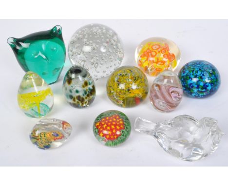 An assortment of vintage 20th century English &amp; Continental glass paperweights to include examples from Rosenthal, Isle o
