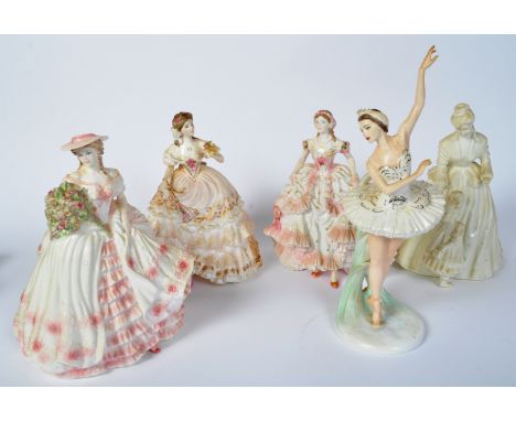 An assortment of vintage 20th century English bone china Royal Worcester &amp; Coalport figurines. The lot to include Royal W