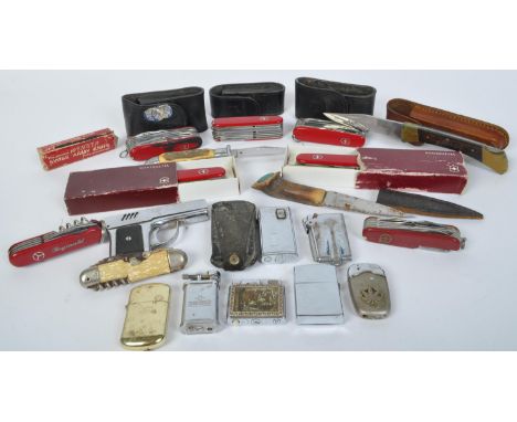 Of Mixed Curious - An assortment of retro vintage 20th century Swiss knives and lighter. The lot to include examples such as 