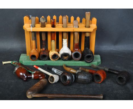 A collection of early 20th century and vintage tobacco smoking pipes. To include a variety of designs such as Danish and Germ