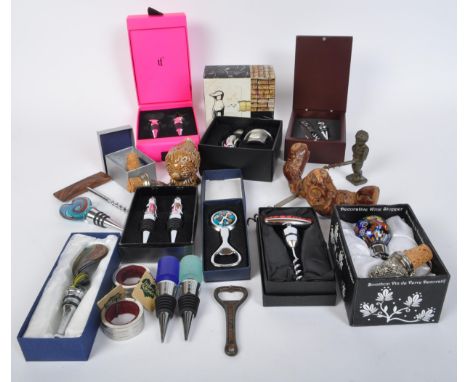 Of Brewiana interest - A collection of vintage and later corkscrews, bottle stoppers, and bottle openers. Some in cases, nove