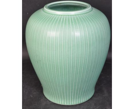 A vintage 20th century Marselis of Denmark porcelain vase. The vase being modelled in a baluster type shape and being painted