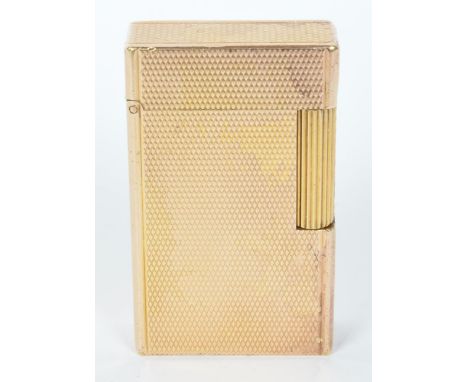 A vintage 20th Century St Dupont gold plated French lighter. With a textured body, hinged lid. Stamped to bottom with MD on b