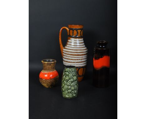 A collection of retro vintage mid 20th Century circa 1970's West German pottery vases. One having a handle with earthly colou