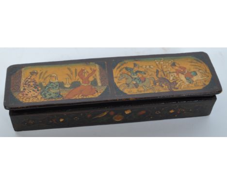An early 20th century Indian hand painted wooden pen case box being decorated with two individua vignettes&nbsp; to depict a 