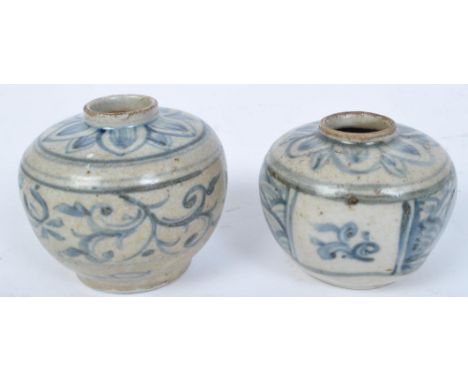 A pair of 19th century Chinese hand painted blue and white ceramic ginger jars. Each being decorated with handing and foliate