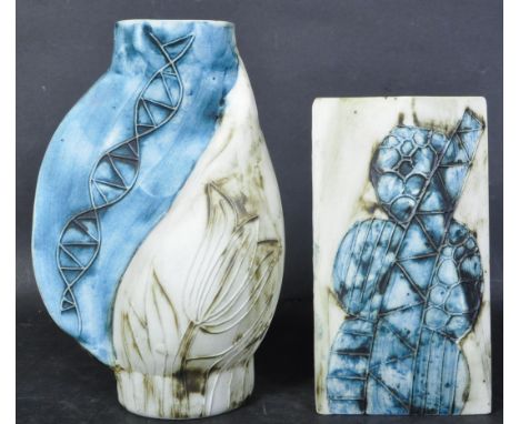 Carn Pottery - Two vintage 20th century Cornish Carn Pottery vases in the manner of Troika. Each having a cream white with fo