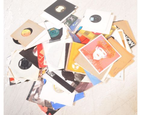 A collection of vintage 20th century 7" / 45rpm vinyl single records comprising of Elton John, Jason Donovan, Pet Shop Boys, 