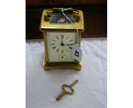 FRENCH BRASS CASED CARRIAGE CLOCK WITH KEY