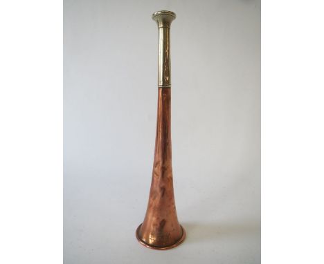Copper and nickel hunting horn by Swaine & Adeney of London Has been well used, some dents