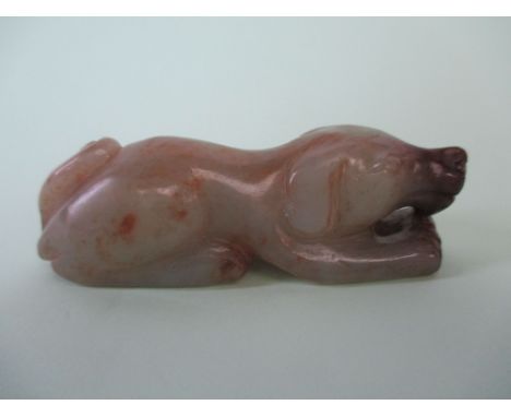 Carved jade figure of a dog. L7.5cm Fair condition