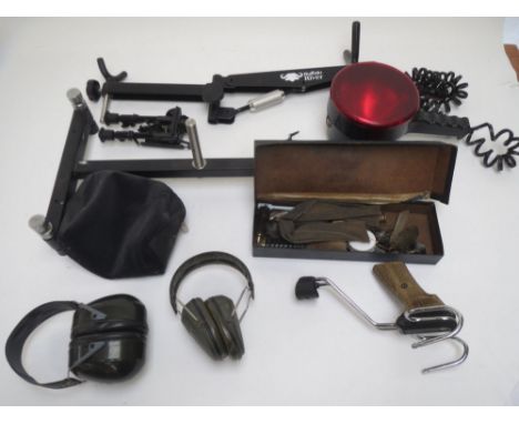 Box of shooting items to include gun tripod, gun stand for cleaning, barrel cleaning kit, stalking lamp with filter cover 