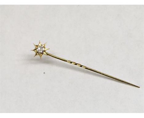  18 carat gold diamond stick pen set with diamond screw thread top not hallmarked but tests as 18ct Gold Diamond measures app