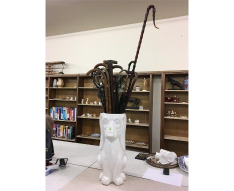 Large Selection of Antique and later walking sticks, to  include Silver tops, Glass horn Walking sticks, within a pot Walking