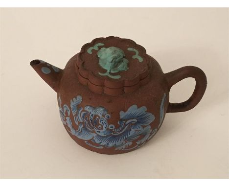  Stone ware Chinese yixing teapot With pho dog finial and enamel dragon decoration  edge chip to rim measures approx 18cm fro