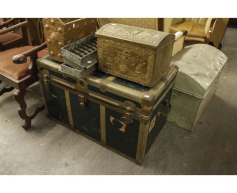 A METAL BOUND CABIN TRUNK AND A METAL DOME TOP TRUNK 