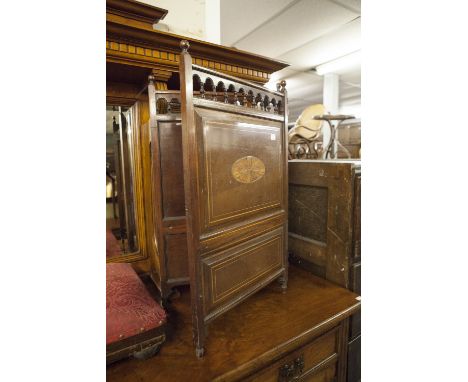 AN INLAID MAHOGANY TWO FOLD FIRE SCREEN AND A LATE VICTORIAN MAHOGANY GOUT STOOL  WITH DOUBLE FOLDING ACTION (2) 