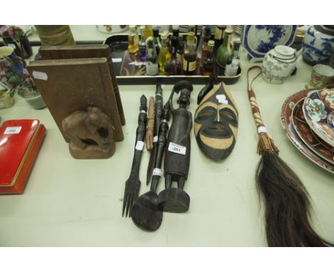 AFRICAN CARVED WOOD INCLUDING; PAIR OF BOOKENDS MODELLED WITH ELEPHANTS, FEMALE FIGURE 'TRIBAL MASK', KNIFE, FORK AND SPOON W
