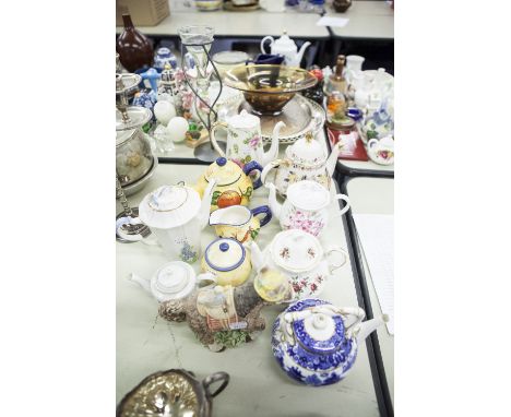 NINE CERAMIC TEA AND COFFEE POTS INCLUDING TWO SHELLEY EXAMPLES, AND ONE WITH MATCHING MILK AND SUGAR 