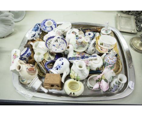 A QUANTITY OF SMALL CERAMIC CABINET ORNAMENTS ETC..... 