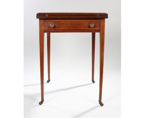 Edwardian mahogany and cross banded envelope card table, the four hinged section top above a frieze drawer and slender taperi