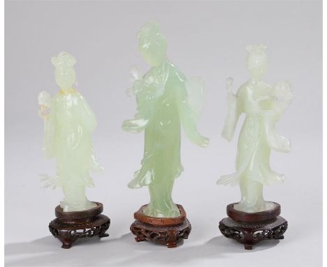 Three Chinese jade figures, three standing females on bases, the tallest 21cm high, (3)