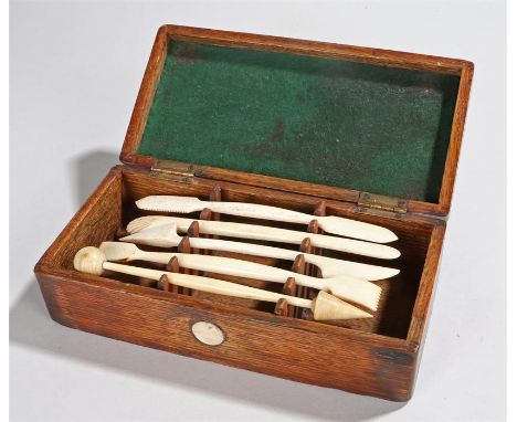 19th century mahogany box, the lid with silver roundel engraved MLA, containing five bone sculptors tools, the box 18.5cm wid