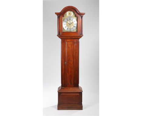 Mahogany longcase clock, W Manlove, London, the arched hood above a glazed door and long trunk door on a panel base, the sign