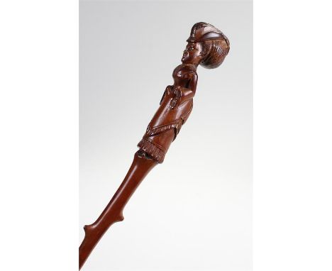 Finely carved 19th Century walking cane, carved as a lady with bonnet and long dress above a tapering stick, 86cm high