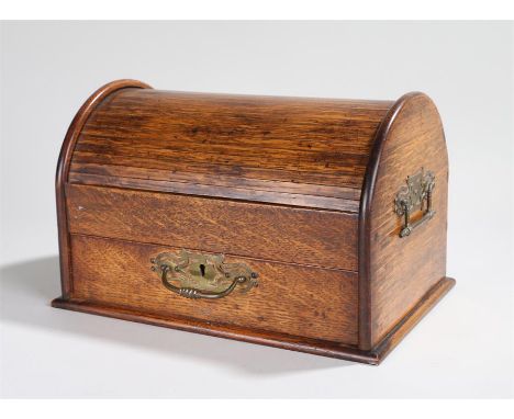 Edwardian tea caddy, the frieze drawer acting as an opening mechanism for the tambour top, opening to reveal two interior com